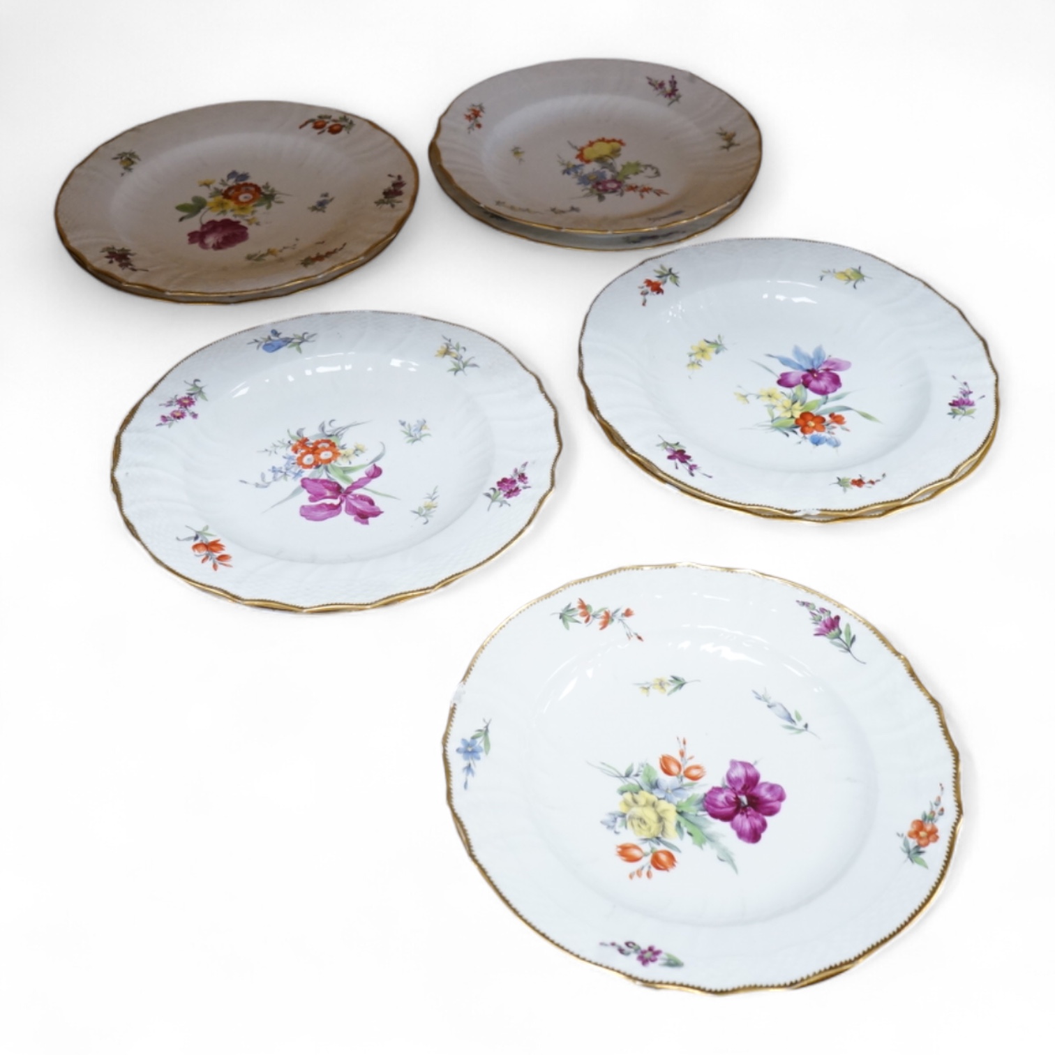 Ten 19th century Copenhagen floral porcelain plates, 23cm in diameter